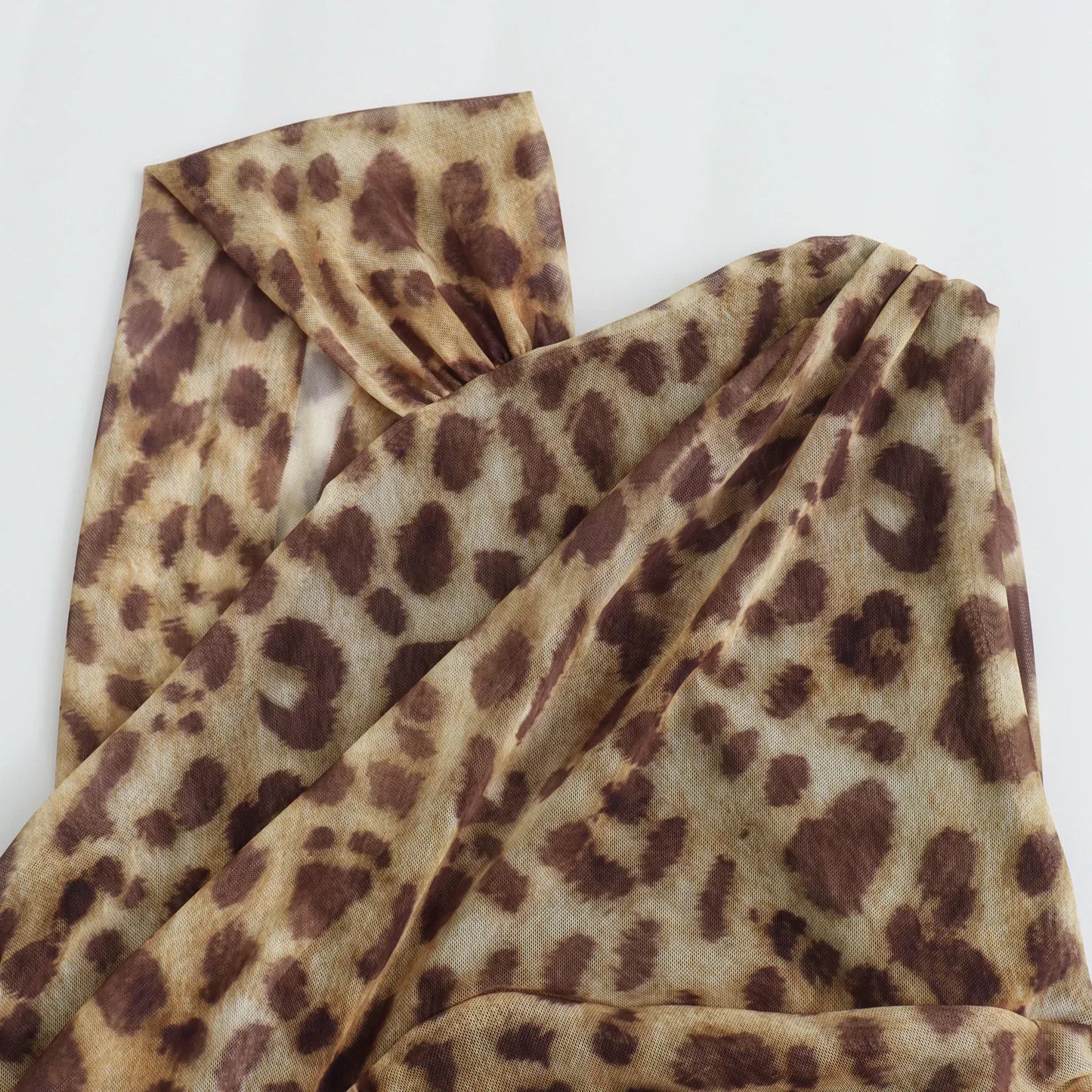 ASYMMETRIC DRAPPED TULLE BODYSUIT