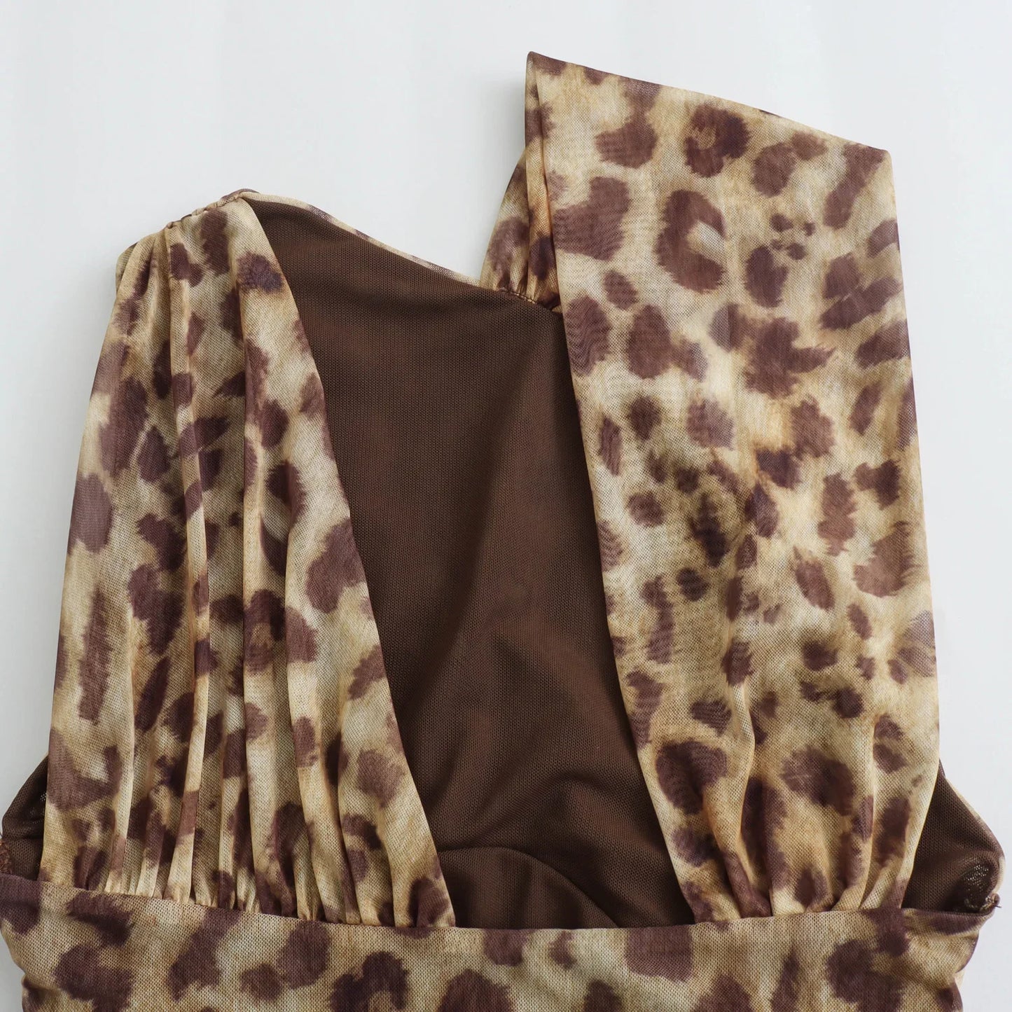 ASYMMETRIC DRAPPED TULLE BODYSUIT