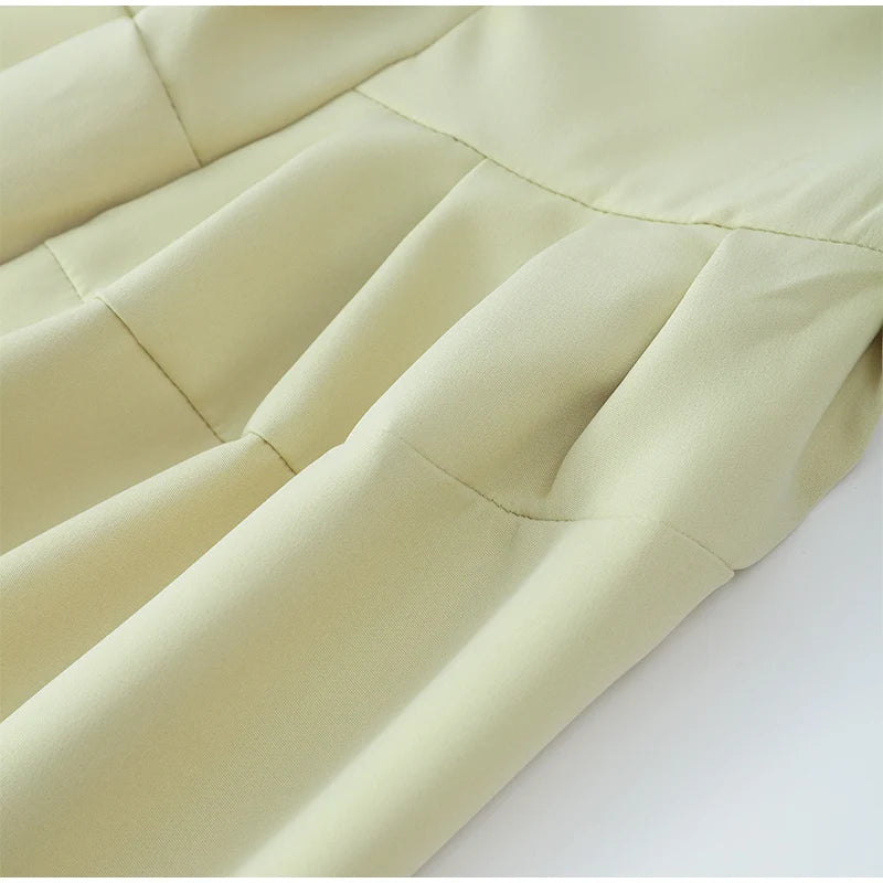 ASYMMETRICAL PLEATED DRESS